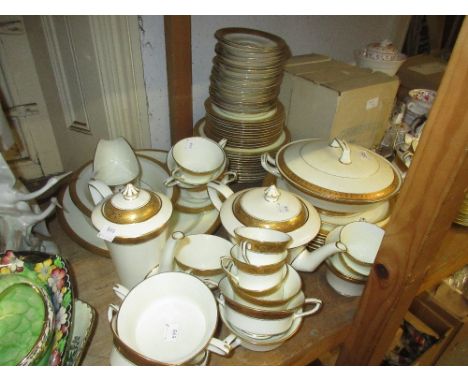 Royal Worcester six place setting dinner and tea service with gold leaf borders