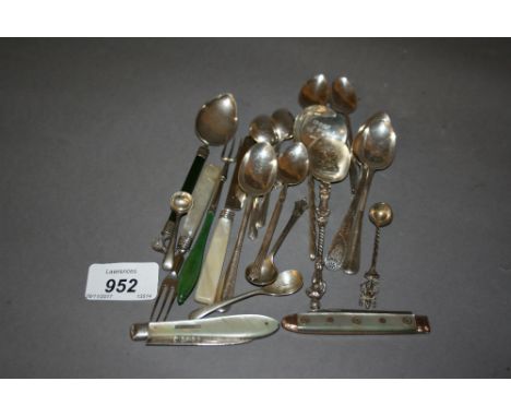 Two silver and mother of pearl folding fruit knives, a miniature silver and mother of pearl handled Christening knife and for