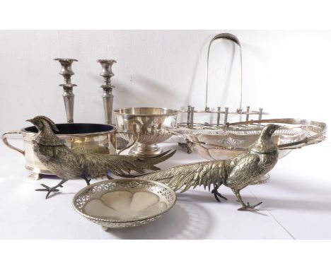 A good selection of silver plate to include:  a three-division bottle carrier with swing-handle a silver-plated bread basket 