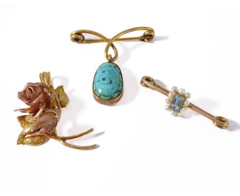 An Edwardian rectangular aquamarine and seed pearl bar brooch (length 3.4cm); a collet-set ovoid engraved turquoise suspended