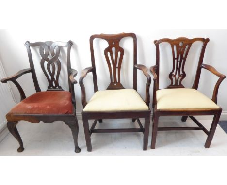 Three Chippendale-style mahogany carver armchairs each with drop-in seat