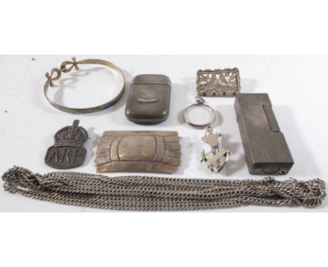 Silver and silver plate to include a Dunhill lighter, an interesting leather-mounted silver stamp box, various badges and bro