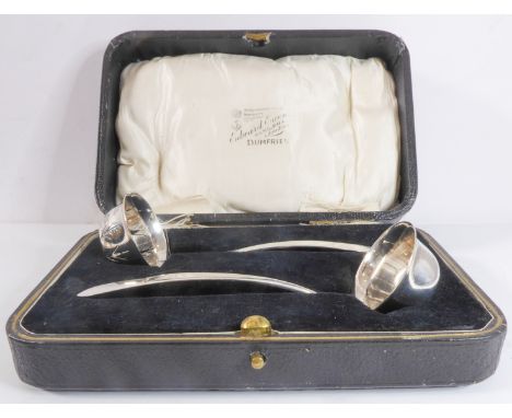 An unusual silver toddy ladle and strainer – retailed by Edward Ewen of Dumfries - Watchmaker to the Admiralty. Hallmarked Sh