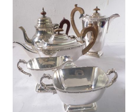 A good early 20th century silver-plated tea service: teapot, hot water jug, two-handled sugar and creamer; each with a raised
