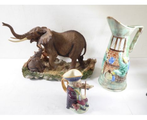 'Nature's Heritage Collectables' by Royal Doulton, a hand-decorated well modelled sculpture of an elephant and calf, together