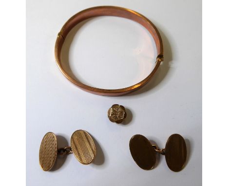 A pair of gentleman's 9-carat gold cufflinks, a 9-carat rose gold bangle and a pair of 9-carat studs (total weight approx. 14