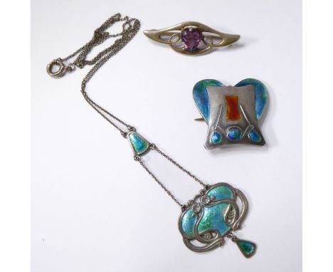 An Art Nouveau enamel and silver pendant by Charles Horner; of trailing openwork design with pale blue/green enamel (slight l