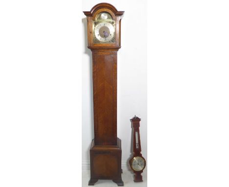 An oak-cased grandmother clock and a&nbsp;mahogany barometer. The clock's dial signed 'Tempus Fugit' and with silvered chapte