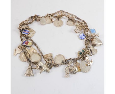 A silver three-row charm bracelet with 37 silver and enamel charms