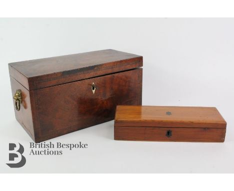 Georgian mahogany double tea caddy, with compartments for green and black tea, mixing bowl is missing, with lion mask carry h