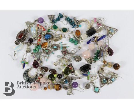 Quantity of semi-precious stone earrings including turquoise, amber, tigers eye, lapis lazuli, enamel and moonstone amongst o