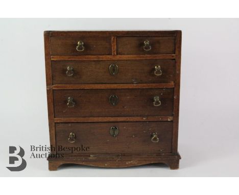 Mahogany apprentice chest of drawers, having two short and three graduated long drawers, with decorative inlay, supported on 
