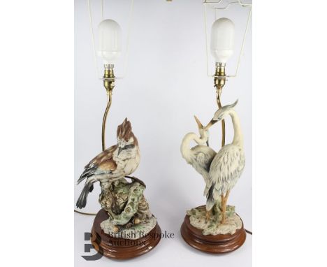 Large Italian figural lamp stands, one in the form of herons spooning, approx 74 cms h and the other a blue jay perching on a