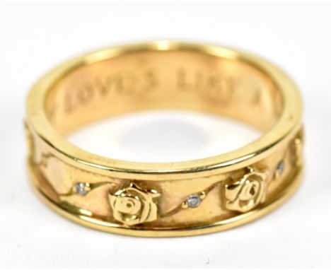 A 9ct gold ring with a band of roses interspersed with small diamonds, inscribed to the inside with 'My Love is Like a Red Re