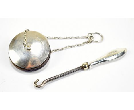 ADIE &amp; LOVEKIN LTD; a George V hallmarked silver mounted wheel form pin cushion, Birmingham 1912, diameter 3.3cm, on silv