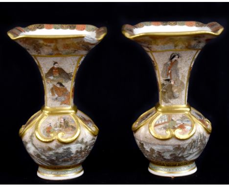 SEIKOZAN; a pair of Satsuma miniature vases with flared square section necks above gilt scroll raised panels to the landscape