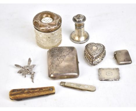 A small group of variously hallmarked silver and silver mounted items including heart shaped foliate decorated trinket box wi