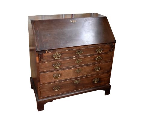 A George III mahogany bureau, with fall-front enclosing fitted interior above four drawers to bracket feet, length 97.5cm (af