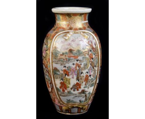 A small Japanese Satsuma vase, decorated with opposing raised panels depicting figures in a landscape, signed to base, height