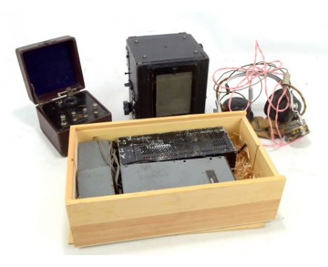 A mixed group of scientific instruments comprising Midget MCR1 Communication Receiver, two sets of headphones, morse code-typ