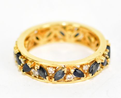 An 18ct gold diamond and sapphire eternity ring, size R.