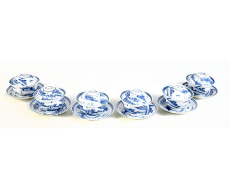 A 19th century Chinese porcelain six setting set of tea bowls, smaller bowls and saucers, all painted in underglaze blue with