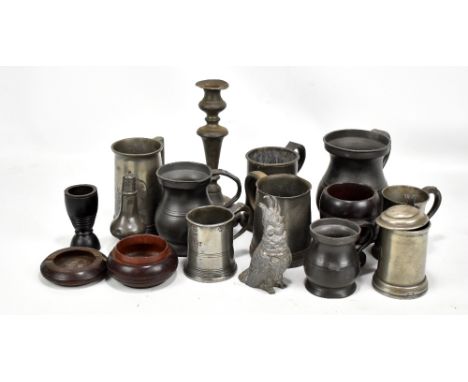 A collection of pewter including mugs, measures, egg cup, wine funnel, etc, some bearing stamps (numerous items af).