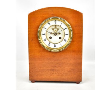 A mahogany cased mantel clock, the circular chapter ring set with Roman numerals, the movement backplate stamped B378, strike