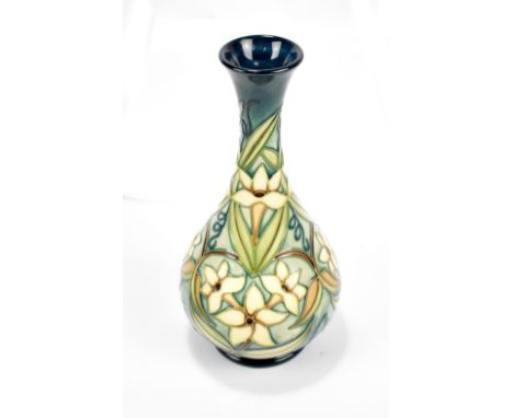 MOORCROFT; a tubeline decorated baluster vase featuring irises, WM monogram with year cipher for 1997 and no. 206 to base, he