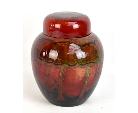 MOORCROFT; a rare and large flambé 'Eventide' pattern lidded ginger jar, William Moorcroft signature and impressed marks to b