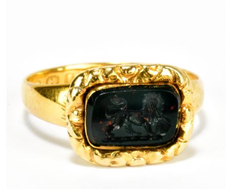 A 22ct yellow gold lion passant intaglio ring, size J to K, approx 3.7g.Additional InformationPlease note the panel is bloods