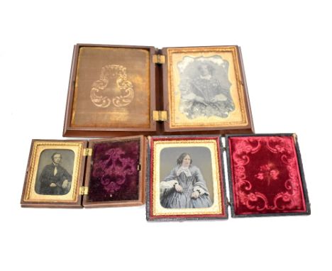 Two late 19th century Daguerreotypes in frames, and also a late 19th century ambrotype (3).