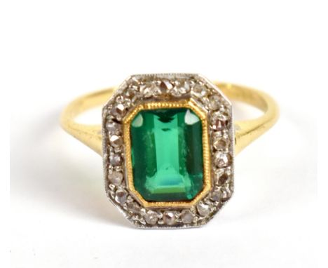 An 18ct yellow gold diamond and green stone panel ring, size L/M, approx 3.6g.