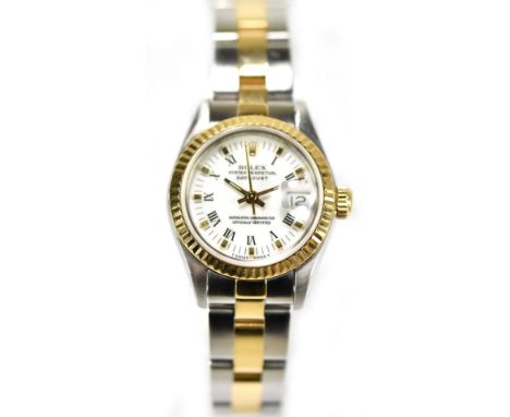 ROLEX; a stainless steel and 18ct yellow gold Oyster perpetual date adjust lady's wristwatch, the white dial set with baton a