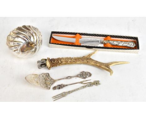 An 800 grade silver cake slice with pierced decoration, with a similar pickle fork, a silver plated pickle fork, a silver pla