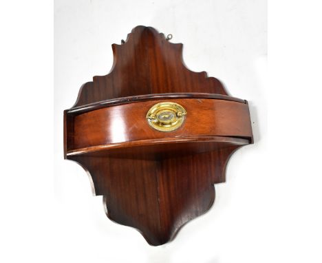 An Edwardian mahogany hanging corner shelf, having single frieze drawer, height 55cm.