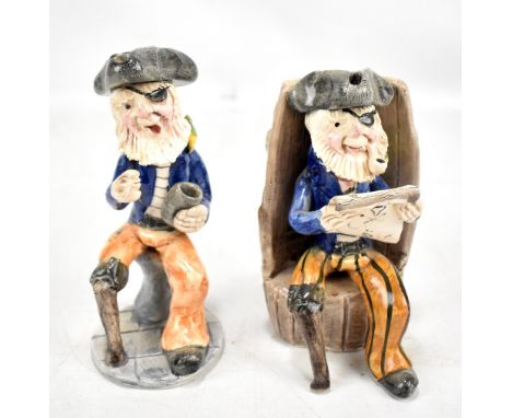 ALAN YOUNG; two pottery figures of the same gentleman with peg leg and wearing eye patch, height of each approx 15cm (2). (D)