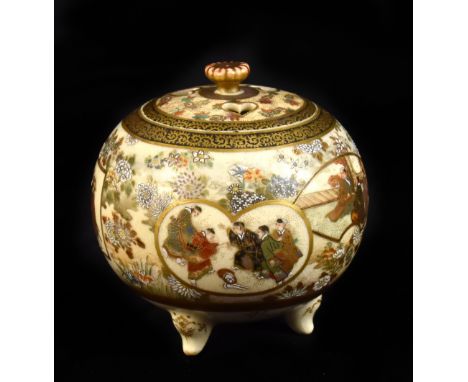 KINKOZAN; a small globular pot pourri jar and cover, the lid with three pierced heart shaped motifs above the main body set w