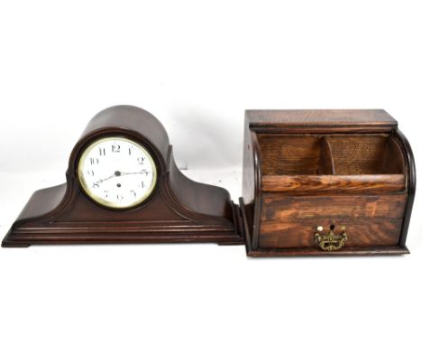 An early 20th century mahogany mantel clock, the circular dial marked Waltham USA, set with Arabic numerals and a 1920s oak s