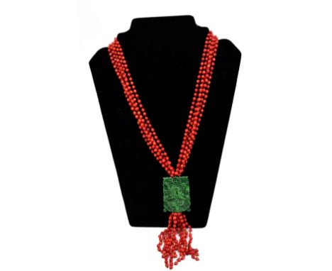 A jade and red bead coral necklace, length approx 50cm.