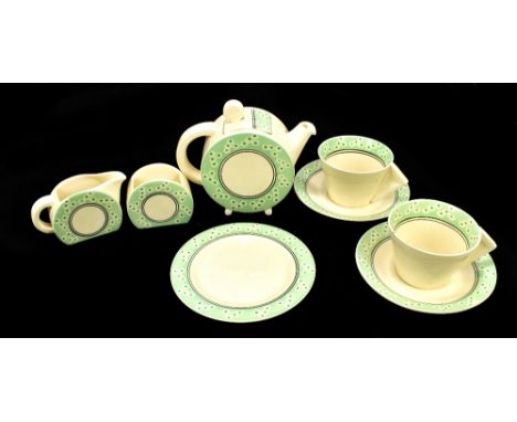 CLARICE CLIFF; an Art Deco 'Bonjour' tea for two service painted with a band of circles on a green and ivory ground, printed 