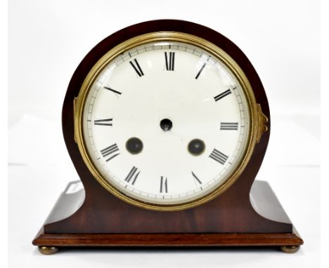 An early 20th century French mahogany cased mantel clock, the enamelled circular dial set with Roman numerals, the movement s