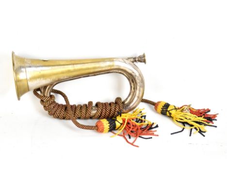 A silver plated bugle with cord.&nbsp;
