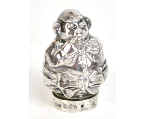 CORNELIUS SAUNDERS &amp; FRANK SHEPHERD; a George V hallmarked silver novelty mount or finial modelled as 'Simple Simon' hold