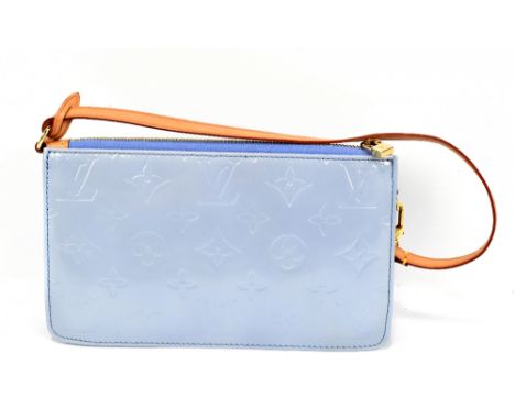 LOUIS VUITTON; a Lexington Pochette monogram bag in light blue vernis leather, with tan leather hand/shoulder strap, with dus