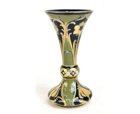 WILLIAM MOORCROFT; A Florian Ware vase decorated in the Green and Gold pattern, signed to base, height 22cm (Restored).Additi