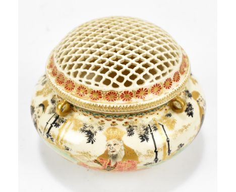 A Japanese Satsuma koro, the reticulated lid with border of stylised floral sprays above main body set with four small gilt h