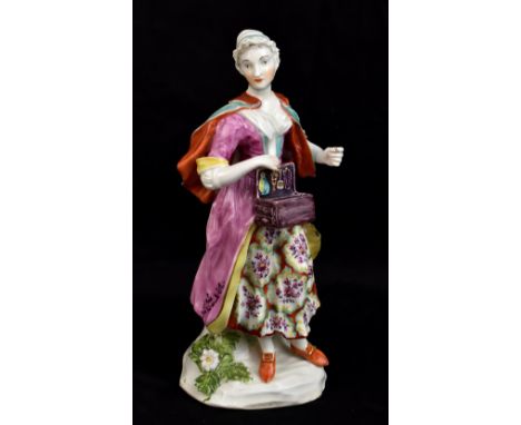 DERBY; a mid-18th century figure of the Jewish pedlar's wife, circa 1760, height 19.5cm.Provenance: from a private Worcesters