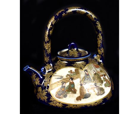 KINKOZAN; a Japanese Satsuma miniature teapot decorated with two opposing heart shaped panels painted with figures within a g