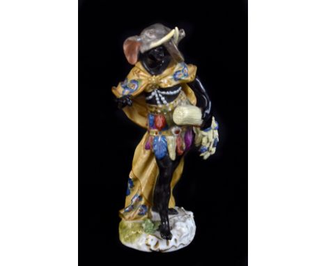 MEISSEN; a mid-18th century figure from The Series of Continents 'Africa', modelled by Paul Reinicke, circa 1750, painted blu